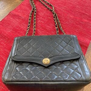 CHANEL Black Quilted Shoulder Bag with Gold Accents